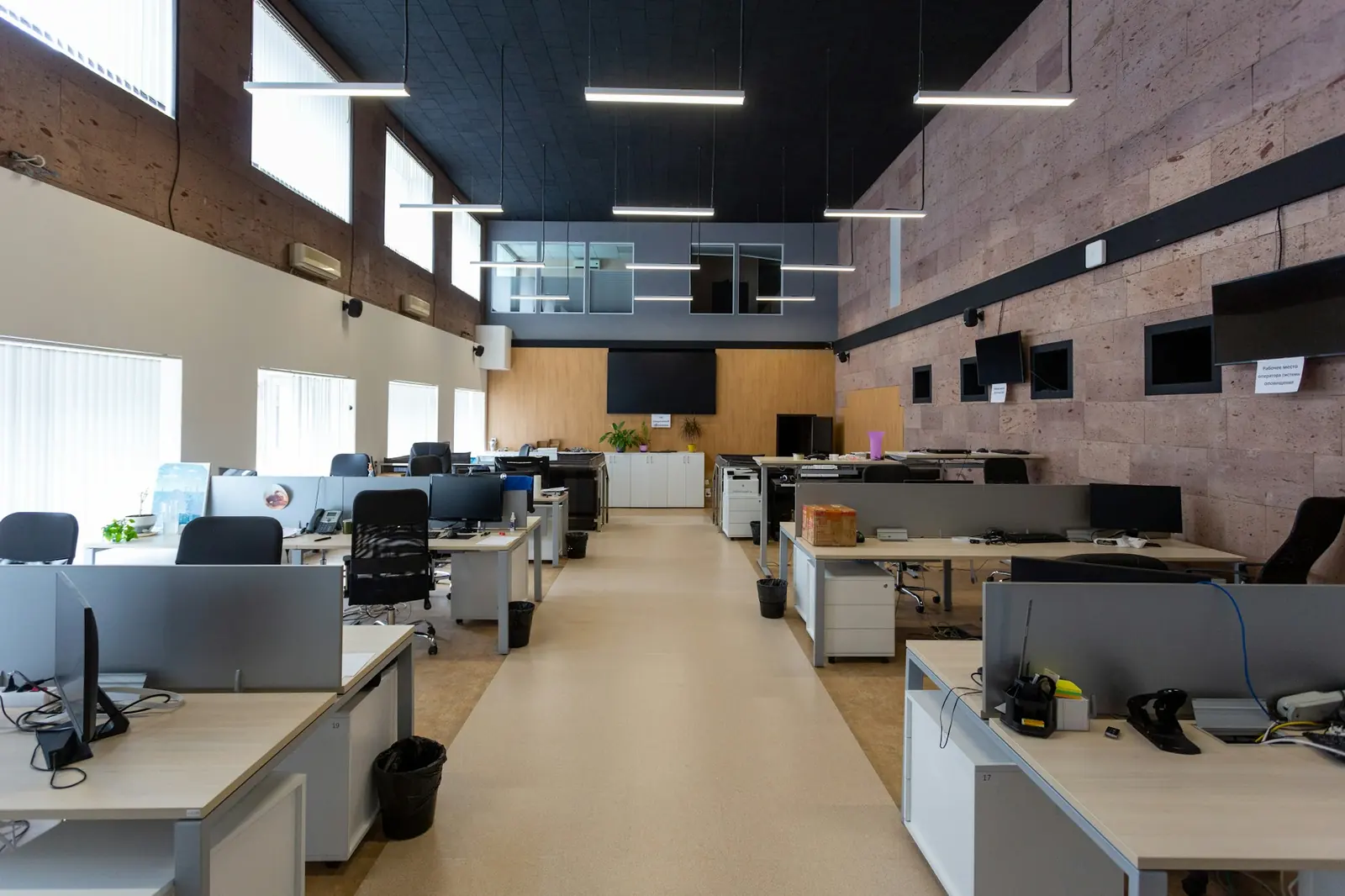 Open plan office with desks and computers